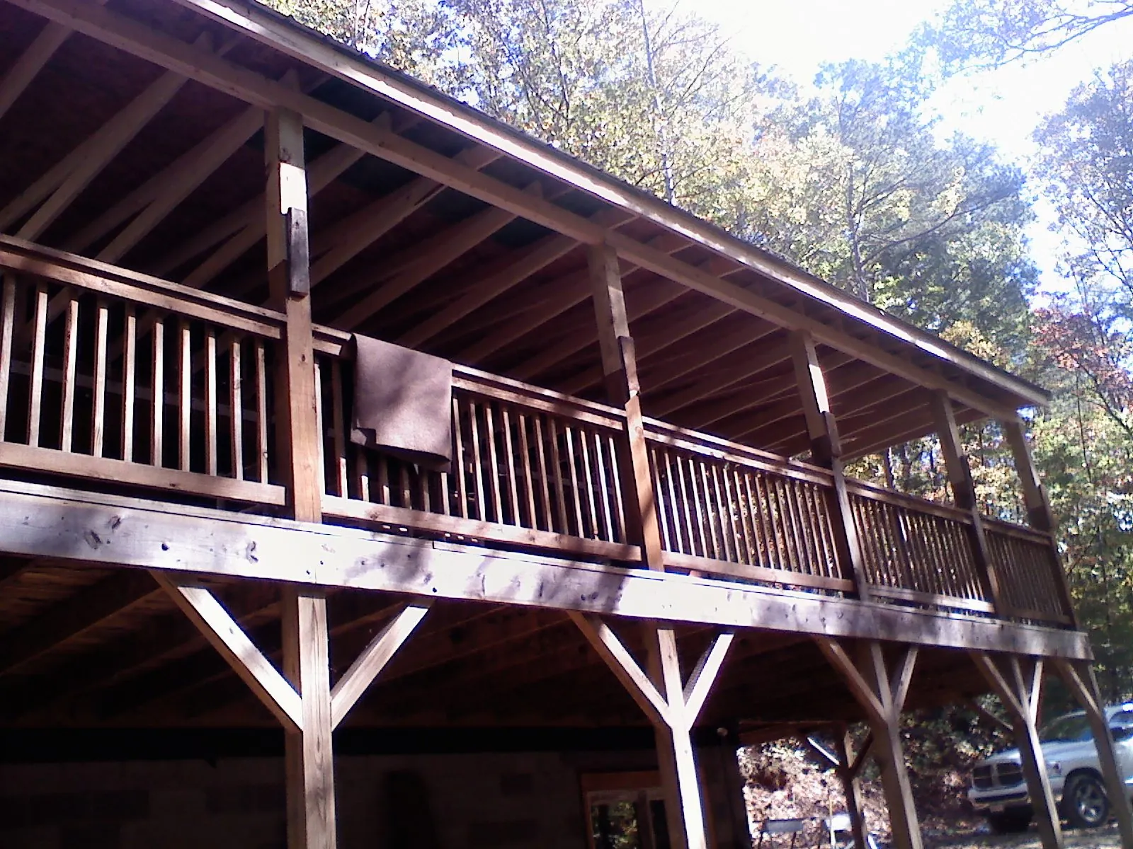 Timber framing under a new elevated porch and deck — Roof Leak Repair in Manassas by Roofing Brothers